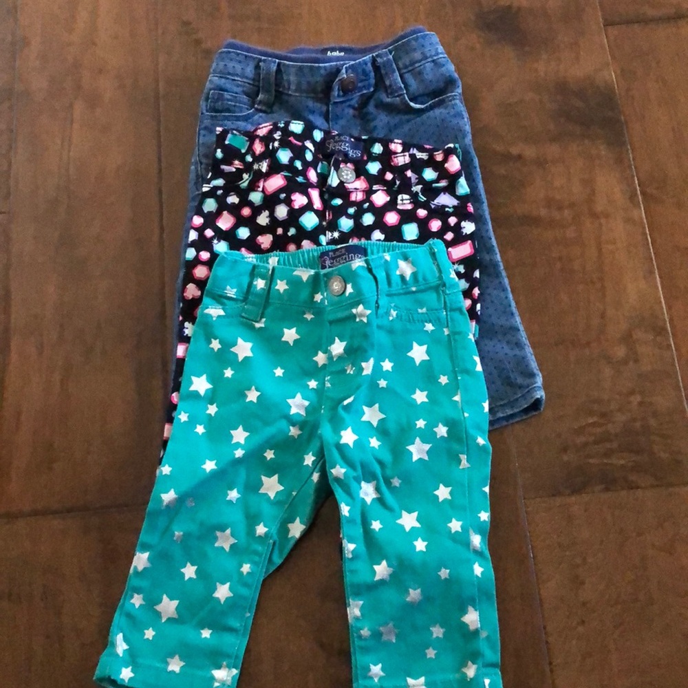 Baby girl 2 are jeggings 1 is jeans.